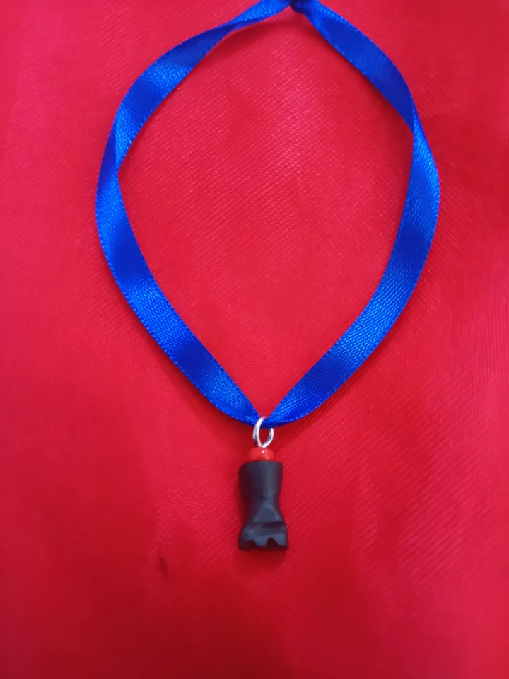 Amuleto de azabache chico con cinta azul